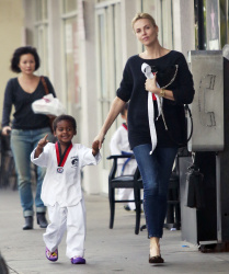 Charlize Theron - spotted taking her son Jackson to his karate class in Los Angeles, California on February 23, 2015 (15xHQ) WmxHbs3u