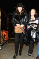 Dakota Johnson - Arriving at LAX Airport in Los Angeles - February 22, 2015 (28xHQ) BK1lonCS